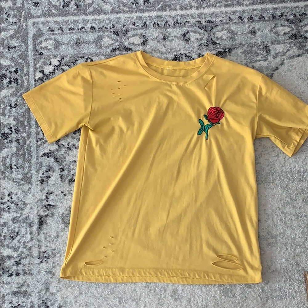 Distressed yellow rose shirt.